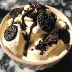 - 2 Tassen Schlagsahne - 1 Dose (397 g) gesüßte Kondensmilch - 1 Teelöffel Vanilleextrakt - 12 Oreos, zerdrückt - 1/2 Tasse Schokoladenstückchen (optional) - Zusätzliche Oreos zur Dekoration Um das beste No Churn Oreo Ice Cream zu machen, brauchen wir einige einfache Zutaten. Schlagsahne ist die Basis. Sie gibt dem Eis seine cremige Textur. Verwende frische Schlagsahne. Sie sollte gut gekühlt sein, damit sie sich leicht schlagen lässt. Die gesüßte Kondensmilch bringt die Süße. Diese Milch macht das Eis besonders lecker und gibt ihm eine tolle Konsistenz. Achte darauf, dass du die richtige Menge verwendest. Ein Teelöffel Vanilleextrakt sorgt für ein tolles Aroma. Es bringt die Geschmäcker zusammen und macht das Eis noch besser. Oreos sind das Herzstück dieses Rezepts. Zerdrücke sie grob, aber nicht zu fein. Du willst noch Stücke im Eis haben, die einen tollen Crunch geben. Wenn du magst, füge auch Schokoladenstückchen hinzu. Sie sind eine köstliche Ergänzung, aber nicht nötig. Dekorative Oreos auf dem Eis machen es besonders schön. Sie sind perfekt, um das Eis zu präsentieren. Das sieht nicht nur toll aus, sondern schmeckt auch besser. Du kannst die Zutaten ganz leicht finden. So wird dein No Churn Oreo Ice Cream sicher ein Hit. Wenn du das gesamte Rezept sehen möchtest, schau dir die Full Recipe an. 1. Beginnen Sie mit einer großen Rührschüssel. Nehmen Sie zwei Tassen Schlagsahne. 2. Schlagen Sie die Schlagsahne mit einem Handmixer. Benutzen Sie mittlere bis hohe Stufe. 3. Schlagen Sie die Sahne, bis sich steife Spitzen bilden. Das dauert etwa 3-5 Minuten. 1. Nehmen Sie eine separate Schüssel. Fügen Sie eine Dose gesüßte Kondensmilch hinzu. 2. Geben Sie einen Teelöffel Vanilleextrakt dazu. 3. Mischen Sie alles gut, bis es gleichmäßig ist. 1. Nehmen Sie die geschlagene Sahne. Heben Sie sie vorsichtig unter die Kondensmilchmischung. 2. Beginnen Sie mit einer kleinen Menge Schlagsahne. Das macht die Mischung leichter. 3. Fügen Sie dann die restliche Sahne nach und nach hinzu. Achten Sie darauf, die Luftigkeit zu bewahren. 4. Zerdrücken Sie 12 Oreos. Fügen Sie diese zur Mischung hinzu. Wenn Sie mögen, können Sie auch Schokoladenstückchen hinzufügen. 5. Gießen Sie die Mischung in einen gefriersicheren Behälter. Streichen Sie die Oberseite glatt. 6. Zerdrücken Sie einige zusätzliche Oreos und streuen Sie sie obenauf. 7. Decken Sie den Behälter mit Frischhaltefolie oder einem Deckel ab. Lassen Sie das Eis mindestens 6 Stunden gefrieren oder bis es fest ist. Für das komplette Rezept schauen Sie sich den Abschnitt "Full Recipe" an. Um das Eis perfekt zu machen, achte auf die Schlagsahne. Schlage sie in einer großen Schüssel, bis sich steife Spitzen bilden. Das dauert etwa drei bis fünf Minuten. Vermeide es, die Sahne zu übermixen. Wenn die Sahne zu flüssig ist, wird das Eis nicht fest. Die Oreos solltest du gleichmäßig in der Mischung verteilen. Zerkleinere sie, bevor du sie hinzufügst. So bekommst du in jedem Löffel ein Stück Oreo. Mische die Oreos vorsichtig unter. Das hält die Luft in der Sahne und macht das Eis fluffig. Das Eis braucht mindestens sechs Stunden, um gut zu gefrieren. Ich empfehle, es über Nacht im Gefrierfach zu lassen. So erreicht es die beste Konsistenz. Wenn das Eis zu kurz gefroren wird, wird es weich und schwer zu schöpfen. Um die beste Konsistenz zu erreichen, lasse das Eis vor dem Servieren einige Minuten bei Raumtemperatur stehen. So wird es leichter, das Eis zu portionieren. Serviere das Eis in schönen Eisschalen. Das macht es ansprechender. Du kannst das Eis mit zerdrückten Oreos dekorieren. Ein wenig Schokoladensauce oben drauf sieht auch toll aus. Füge frische Minzblätter hinzu, um Farbe und Frische zu geben. Das macht dein Eiserlebnis noch schöner und leckerer. {{image_4}} Ich liebe es, mit verschiedenen Keksen zu experimentieren. Statt Oreos kannst du auch andere Kekse nutzen. Probiere Chips Ahoy oder Butterkekse. Sie geben dem Eis einen neuen Geschmack. Du kannst auch verschiedene Eissorten machen. Füge etwas Erdnussbutter oder Karamell hinzu. Das macht dein Eis noch schmackhafter. Für eine gesunde Variante kannst du zuckerfreie oder laktosefreie Produkte verwenden. Suche nach zuckerfreier Kondensmilch und laktosefreier Sahne. So bleibt der Genuss ohne schlechtes Gewissen. Das Eis schmeckt trotzdem lecker und cremig. Denke an leckere Toppings! Schokoladensauce ist eine großartige Wahl. Du kannst auch frische Früchte hinzufügen. Himbeeren oder Erdbeeren passen perfekt. Sie bringen Frische und Farbe ins Spiel. Mische alles gut und genieße das Eis in vollen Zügen. Um Ihr No Churn Oreo Eis gut zu lagern, verwenden Sie einen luftdichten Behälter. Dieser schützt das Eis vor Gefrierbrand. Stellen Sie den Behälter in den kältesten Teil des Gefrierschranks. Die optimale Temperatur liegt bei minus 18 Grad Celsius oder kälter. So bleibt das Eis länger frisch und lecker. Das fertige Eis bleibt bis zu zwei Monate frisch. Nach dieser Zeit kann der Geschmack nachlassen. Achten Sie auf Anzeichen von Verderb, wie Eiskristalle oder einen unangenehmen Geruch. Das Eis könnte auch seine cremige Textur verlieren. Um das Eis richtig aufzutauen, lassen Sie es etwa 10 Minuten bei Raumtemperatur stehen. So wird es weicher, aber nicht zu flüssig. Verwenden Sie einen stabilen Löffel, um das Eis zu schöpfen. Servieren Sie es in schönen Eisschalen, garniert mit zusätzlichen zerdrückten Oreos. Für das beste Geschmackserlebnis genießen Sie es sofort nach dem Servieren. Das No Churn Oreo Ice Cream braucht mindestens 6 Stunden, um fest zu werden. Wenn du es schneller genießen möchtest, friere es in einer flachen Form ein. Dadurch gefriert es schneller. Du kannst auch die Zeit überbrücken, indem du ein paar Spiele spielst oder einen Film schaust. Ja, du kannst die Menge anpassen. Wenn du mehr Eis willst, verdopple einfach alle Zutaten. Für weniger Eis halbiere die Zutaten. Achte darauf, dass du die Gefrierform anpasst, damit es gleichmäßig gefriert. Du kannst viele andere Kekse verwenden. Zum Beispiel sind Chips Ahoy oder Nutter Butter gute Alternativen. Auch zerdrückte Schokoladenkekse oder Waffeln passen gut. Für mehr Abwechslung kannst du auch Nüsse oder frische Früchte hinzufügen. Das Rezept ergibt etwa 8 bis 10 Portionen. Eine Portion ist ungefähr eine halbe Tasse. Wenn du eine größere Gruppe bewirtet, kannst du die Portionen einfach anpassen. Jeder wird es lieben! Um leckeres No Churn Oreo Eis zuzubereiten, brauchst du nur wenige Zutaten. Wir haben die Schritte zur Zubereitung erklärt und Tipps und Tricks gegeben, um es perfekt zu machen. Denke daran, die Lagerung richtig zu gestalten, damit dein Eis lange frisch bleibt. Variiere das Rezept mit anderen Keksen oder Aromen für neue Geschmackserlebnisse. Dieses Eis ist einfach und macht Spaß. Bleib kreativ und genieße jede Portion!