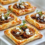 - 1 Blatt gefrorener Blätterteig, aufgetaut - 2 große Zwiebeln, dünn geschnitten - 115 g Ziegenkäse, zerkrümelt Die Hauptzutaten sind einfach und leicht zu finden. Der gefrorene Blätterteig macht das Rezept schnell. Die Zwiebeln geben süßen Geschmack, wenn sie karamellisiert sind. Ziegenkäse bringt eine cremige Note. - 2 Esslöffel Olivenöl - 1 Esslöffel Balsamico-Essig - 1 Teelöffel Zucker - Frische Thymianblätter, zum Garnieren - Salz und Pfeffer nach Geschmack Die Gewürze sind wichtig für den Geschmack. Olivenöl hilft beim Braten der Zwiebeln. Balsamico und Zucker verstärken die Süße. Thymian gibt einen frischen Duft und ein tolles Aussehen. - Backblech und Backpapier - Scharfes Messer - 1 Ei, verquirlt (zum Bestreichen) Die Utensilien sind nötig, um die Törtchen zu backen. Das Backblech mit Backpapier verhindert das Ankleben. Ein scharfes Messer hilft beim Schneiden der Zwiebeln. Das verquirlte Ei sorgt für eine schöne goldene Farbe beim Backen. Heize deinen Ofen auf 200°C vor. Lege ein Backblech mit Backpapier aus. Dies hilft beim einfachen Herausnehmen der Törtchen. Schneide die Zwiebeln dünn. Verwende eine scharfe Klinge, um gleichmäßige Ringe zu erhalten. Erhitze das Olivenöl in einer großen Pfanne bei mittlerer Hitze. Füge die Zwiebeln und eine Prise Salz hinzu. Rühre die Zwiebeln häufig um, damit sie gleichmäßig garen. Koche die Zwiebeln 15-20 Minuten lang. Sie sollten goldbraun und weich werden. Wenn sie schön karamellisiert sind, füge den Balsamico-Essig und den Zucker hinzu. Rühre die Mischung gut um. Lasse sie für 2-3 Minuten kochen. Der Essig sollte etwas eindicken. Nimm die Pfanne vom Herd. Lass die Mischung etwas abkühlen, damit sie später nicht den Blätterteig durchweicht. Rolle den aufgetauten Blätterteig auf einer leicht bemehlten Fläche aus. Schneide den Teig in Quadrate von etwa 10 cm. Lege diese auf das Backblech. Schneide mit einem scharfen Messer ein kleineres Quadrat in jede Teigportion. Achte darauf, den Teig nicht ganz durchzuschneiden. Bestreiche die Ränder des Blätterteigs mit dem verquirlten Ei. Löffle die karamellisierte Zwiebelmischung in die Mitte jedes Teigstücks. Zerkrümle den Ziegenkäse über die Zwiebeln. Backe die Törtchen 15-20 Minuten lang. Sie sind fertig, wenn der Teig goldbraun und aufgegangen ist. Die Karamellisierung von Zwiebeln ist eine Kunst. Hier sind meine besten Tipps: - Langsame Hitze: Kochen Sie die Zwiebeln bei mittlerer Hitze. So bleiben sie zart. - Geduld: Lassen Sie die Zwiebeln 15-20 Minuten kochen, bis sie goldbraun sind. - Salz: Eine Prise Salz hilft, die Süße der Zwiebeln hervorzuheben. - Zucker: Fügen Sie einen Teelöffel Zucker hinzu. Das verstärkt die Karamellisierung. - Balsamico: Ein Esslöffel Balsamico-Essig gibt den Zwiebeln einen tollen Geschmack. Verwenden Sie verschiedene Öle, um den Geschmack zu ändern. Olivenöl ist klassisch, aber auch Traubenkernöl gibt einen feinen Geschmack. Der Umgang mit gefrorenem Blätterteig kann knifflig sein. Hier sind einige Tipps: - Auftauen: Lassen Sie den Blätterteig im Kühlschrank über Nacht auftauen. So bleibt er fest. - Bemehlen: Bestäuben Sie die Arbeitsfläche leicht mit Mehl. Dadurch bleibt der Teig nicht kleben. - Ausrollen: Rollen Sie den Teig sanft aus, um ihn nicht zu beschädigen. Wenn der Teig klebt, verwenden Sie mehr Mehl. Achten Sie darauf, dass Sie nicht zu viel Mehl verwenden, sonst wird der Teig trocken. Die Präsentation der Törtchen ist wichtig. So richten Sie sie an: - Rustikales Holzbrett: Servieren Sie die Törtchen auf einem Holzbrett. Das sieht schön aus. - Zusätzlicher Thymian: Garnieren Sie die Törtchen mit frischen Thymianblättern. Das bringt Farbe. - Getränke: Ein trockener Weißwein passt gut zu den Törtchen. Auch ein frischer Salat ist eine gute Beilage. Denken Sie daran, die Törtchen warm zu servieren. So schmecken sie am besten! {{image_4}} Wenn Sie eine vegane oder laktosefreie Version machen möchten, gibt es tolle Alternativen. Nutzen Sie pflanzliche Butter anstelle von Olivenöl. Für den Käse probieren Sie einen veganen Frischkäse oder Cashewkäse. Diese Optionen bieten einen ähnlichen Geschmack und eine cremige Textur. Sie können auch andere Käsesorten verwenden. Feta oder Ricotta passen gut zu Zwiebeln. Diese Käse geben dem Gericht einen anderen, aber leckeren Geschmack. Experimentieren Sie mit verschiedenen Käsesorten, um Ihre Lieblingskombination zu finden. Saisonalität spielt eine große Rolle in der Küche. Im Frühling können Sie Spargel oder Erbsen hinzufügen. Im Herbst sind Kürbis oder Pilze großartige Optionen. Diese Zutaten ergänzen den Geschmack der karamellisierten Zwiebeln und des Käses. Achten Sie darauf, frisches Gemüse zu wählen. Es schmeckt besser und hat mehr Nährstoffe. Passen Sie die Törtchen je nach Jahreszeit an. So bleibt Ihr Gericht immer interessant und lecker. Um Ihre Törtchen aufzupeppen, fügen Sie Gewürze oder frische Kräuter hinzu. Thymian ist eine tolle Wahl, aber auch Rosmarin oder Oregano passen gut. Diese Kräuter geben zusätzlichen Geschmack. Sie können auch mit süßen und herzhaften Füllungen experimentieren. Fügen Sie etwas Honig oder Feigenmarmelade hinzu. Diese süßen Noten harmonieren gut mit dem salzigen Käse. Seien Sie kreativ und finden Sie neue Kombinationen, die Ihnen gefallen. Um die Törtchen frisch zu halten, lagern Sie sie am besten im Kühlschrank. Stellen Sie sicher, dass sie in einem luftdichten Behälter sind. So bleiben sie bis zu drei Tage lecker. Wenn Sie die Törtchen länger aufbewahren möchten, können Sie sie einfrieren. Wickeln Sie jedes Törtchen in Frischhaltefolie und legen Sie sie in einen Gefrierbeutel. Sie können sie bis zu drei Monate im Gefrierfach lassen. Wenn Sie die Törtchen aufwärmen möchten, ist der Ofen die beste Wahl. Heizen Sie ihn auf 180 °C vor. Legen Sie die Törtchen auf ein Backblech und backen Sie sie etwa 10-15 Minuten. So werden sie knusprig und warm. Um den Geschmack zu erneuern, können Sie etwas frisches Olivenöl darüberträufeln. Ein paar frische Thymianblätter helfen auch, das Aroma zu beleben. Genießen Sie diese kleinen Leckerbissen warm für den besten Genuss. Die Törtchen sind im Kühlschrank etwa drei Tage haltbar. Bewahre sie in einem luftdichten Behälter auf. Im Gefrierschrank halten sie bis zu drei Monate. Du kannst sie nach dem Backen einfrieren. Einfach gut einpacken, damit sie frisch bleiben. Ja, du kannst die Törtchen im Voraus zubereiten. Bereite die Zwiebelmischung und den Blätterteig vor. Lagere die Zutaten getrennt im Kühlschrank. Backe die Törtchen erst kurz vor dem Servieren. So bleiben sie knusprig und frisch. Zu den Törtchen passen viele Beilagen. Ein frischer grüner Salat ist ideal. Du kannst auch einen Joghurt-Dip oder eine Tomatensalsa anbieten. Diese Beilagen ergänzen den reichen Geschmack der Törtchen wunderbar. Zusammengefasst haben wir die besten Zutaten für leckere Törtchen besprochen. Wir haben gelernt, wie man die Zwiebeln perfekt karamellisiert und die Törtchen richtig zubereitet. Tipps zur Lagerung und Variationen zeigen, wie flexibel dieses Rezept ist. Du kannst kreativ sein, verschiedene Käsesorten nutzen oder saisonales Gemüse integrieren. Denke daran, beim Servieren eine ansprechende Präsentation zu wählen. So wird dein Gericht garantiert ein Hit bei Familie und Freunden. Probier es aus und genieße dein Ergebnis!