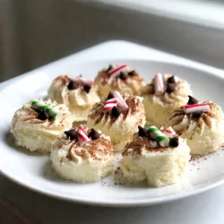 Für diese leckeren Bites brauchst du: - 240 g Frischkäse, weich gerührt - 60 g Puderzucker - 1 Teelöffel Vanilleextrakt - 1/2 Teelöffel Pfefferminzextrakt - 240 ml Cool Whip (oder Schlagsahne) - 100 g zerbröselte Graham-Cracker - 30 g ungesüßtes Kakaopulver (zum Bestäuben) - Mini-Schokoladenstückchen (zum Garnieren) - Zerkleinerte Pfefferminzbonbons (zur Dekoration) Diese Zutaten sorgen für den perfekten Geschmack. Der Frischkäse gibt die cremige Basis. Die Pfefferminz- und Vanilleextrakte bringen das besondere Aroma. Um diese Bites zu machen, brauchst du: - Rührschüssel - Handmixer oder Schneebesen - Löffel oder Spatel - Backblech - Backpapier - Frischhaltefolie Diese Geräte helfen dir, die Mischung gut zu vermengen und die Bites zu formen. Ein Handmixer macht das Rühren leichter. Hier sind die Mengen, die du brauchst und umrechnungen, falls du andere Einheiten verwendest: - 240 g Frischkäse = etwa 8 oz - 60 g Puderzucker = etwa 1/2 Tasse - 240 ml Cool Whip = etwa 1 Tasse - 100 g Graham-Cracker = etwa 1 Tasse zerbröselte Krümel - 30 g Kakaopulver = etwa 1/4 Tasse Das sind einfache Umrechnungen. So kannst du die Zutaten leicht anpassen, wenn du mehr oder weniger Bites machen willst. {{ingredient_image_2}} Zuerst sammeln wir die Zutaten. Wir brauchen: - 240 g Frischkäse, weich gerührt - 60 g Puderzucker - 1 Teelöffel Vanilleextrakt - 1/2 Teelöffel Pfefferminzextrakt - 240 ml Cool Whip - 100 g zerbröselte Graham-Cracker Zuerst rühre ich den Frischkäse mit dem Puderzucker glatt. Achte darauf, dass keine Klumpen bleiben. Dann füge den Vanille- und Pfefferminzextrakt hinzu. Diese Aromen geben den Bites ihren besonderen Geschmack. Nun kommt der Cool Whip dazu. Ich hebe ihn vorsichtig unter, um die Mischung leicht und fluffig zu halten. Anschließend gebe ich die zerbröselten Graham-Cracker hinzu und vermenge alles gut. Jetzt forme ich kleine Kugeln aus der Mischung. Jede Kugel sollte etwa 2,5 cm groß sein. Ich benutze meine Hände dafür. Es macht Spaß und die Bites bekommen so eine schöne Form. Ich lege die Kugeln auf ein mit Backpapier ausgelegtes Blech. Diese Schritte sind einfach und schnell. Wenn alle Bites geformt sind, decke ich das Blech mit Frischhaltefolie ab. Jetzt muss alles für mindestens 2 Stunden in den Kühlschrank. Dies hilft den Bites, fest zu werden. Nach der Kühlzeit sind die Bites bereit für den letzten Schliff. Ich wälze sie in ungesüßtem Kakaopulver, damit sie schön aussehen. Alternativ kann ich sie auch unbedeckt lassen. Zum Schluss dekoriere ich die Bites mit Mini-Schokoladenstückchen und zerkleinerten Pfefferminzbonbons. Diese Schritte verleihen den Bites ein festliches Aussehen und einen tollen Geschmack. Um die perfekte Konsistenz zu erreichen, beginne mit zimmerwarmem Frischkäse. Das macht das Mischen einfacher. Rühre den Frischkäse und Puderzucker gut zusammen. Achte darauf, dass keine Klumpen bleiben. Nach dem Mischen füge die Aromastoffe hinzu. Der Cool Whip ist der Schlüssel zur fluffigen Textur. Hebe ihn vorsichtig unter. So bleibt die Mischung leicht und luftig. Du kannst die Käsekuchen-Bites anpassen, um neue Geschmäcker zu entdecken. Füge etwas Zimt oder Muskatnuss hinzu, um den Bites Wärme zu geben. Du kannst auch andere Extrakte verwenden, wie Mandeln oder Orangen. Für eine schokoladige Note mische etwas geschmolzene Schokolade unter die Käsemischung. Experimentiere mit verschiedenen Toppings, um deine persönliche Note hinzuzufügen. Ein häufiger Fehler ist, zu kalten Frischkäse zu verwenden. Das führt zu einer klumpigen Mischung. Ein weiterer Fehler ist, zu viel Cool Whip hinzuzufügen. Das kann die Bites zu weich machen. Stelle sicher, dass du die Bites genug kühlst. Andernfalls halten sie nicht gut zusammen. Achte auch darauf, die Bites gleichmäßig zu formen. So sehen sie schön und einheitlich aus. Pro Tipps Frischkäse richtig vorbereiten: Stelle sicher, dass der Frischkäse wirklich weich und zimmerwarm ist, damit er sich einfach mit den anderen Zutaten vermischen lässt. Cool Whip vorsichtig unterheben: Um die fluffige Konsistenz zu erhalten, hebe den Cool Whip sanft unter die Mischung, anstatt ihn kräftig zu rühren. Variationen ausprobieren: Füge zusätzlich ein wenig Schokoladenextrakt hinzu oder experimentiere mit anderen Aromen wie Orange oder Zimt für eine interessante Geschmacksnote. Perfekte Portionen: Verwende einen Esslöffel, um gleichmäßige Portionen zu formen und die Bites in eine einheitliche Größe zu bringen, was die Präsentation verbessert. {{image_4}} Für eine glutenfreie Version der No Bake Pfefferminz-Käsekuchen Bites, ersetze die Graham-Cracker. Verwende glutenfreie Kekse oder Hafermehl. Die Mischung bleibt trotzdem lecker und cremig. Achte darauf, dass alle Zutaten glutenfrei sind. So kannst du jeden Genuss ohne Sorgen teilen. Um diese Bites vegan zu machen, wähle pflanzlichen Frischkäse. Viele Marken bieten tolle Alternativen an. Nutze auch eine pflanzliche Sahne, wie Kokos- oder Sojasahne. Statt Puderzucker kannst du Agavendicksaft verwenden. Diese Änderungen schaffen eine cremige, leckere vegane Version. Garnierungen bringen die Bites zum Strahlen! Du kannst sie mit Schokoladensauce beträufeln oder mit Kakaopulver bestäuben. Zerkleinerte Nüsse oder bunte Streusel geben einen tollen Crunch. Frische Minzblätter machen das Ganze festlich und frisch. Lass deiner Kreativität freien Lauf und kreiere deine eigene Version dieser Bites! Ich empfehle, die Käsekuchen Bites in einem luftdichten Behälter aufzubewahren. So bleiben sie frisch und lecker. Verwende ein Behältnis, das nicht zu groß ist. Dadurch wird verhindert, dass die Bites im Behälter hin und her rutschen. Ein Platz im Kühlschrank ist ideal. Im Kühlschrank bleiben die Käsekuchen Bites bis zu einer Woche frisch. Achte darauf, dass sie gut verpackt sind. Nach ein paar Tagen kann die Konsistenz etwas weicher werden, aber der Geschmack bleibt toll. Wenn du sie länger aufbewahren möchtest, ist das Einfrieren eine gute Option. Um die Bites einzufrieren, lege sie auf ein Backblech. Lass sie für ein paar Stunden im Gefrierfach. Wenn sie fest sind, kannst du sie in einen luftdichten Behälter geben. Die Bites halten sich so bis zu drei Monate. Zum Auftauen stelle sie einfach für ein paar Stunden in den Kühlschrank. So bleiben sie lecker und cremig. No Bake Pfefferminz-Käsekuchen Bites sind im Kühlschrank bis zu einer Woche haltbar. Lagere sie in einem luftdichten Behälter. So bleiben sie frisch und lecker. Wenn du sie länger aufbewahren möchtest, kannst du sie auch einfrieren. In der Gefriertruhe halten sie bis zu drei Monate. Achte darauf, sie gut zu verpacken, damit sie nicht austrocknen. Ja, du kannst die Schokoladenstückchen weglassen. Die Bites schmecken auch ohne sie gut. Wenn du eine andere Textur oder Süße möchtest, füge gehackte Nüsse oder Trockenfrüchte hinzu. So bleibt der Geschmack spannend und frisch. Du kannst auch mehr zerkleinerte Pfefferminzbonbons verwenden, um den Bites mehr Pep zu geben. Du kannst Sahne anstelle von Cool Whip verwenden. Schlage die Sahne bis sie fest wird, und hebe sie vorsichtig unter die Käsekuchen-Mischung. Eine andere Option ist griechischer Joghurt, der eine gesündere Wahl bietet. Er hat einen tollen Geschmack und eine cremige Textur. Denke daran, dass die Bites dann etwas anders schmecken können. No Bake Pfefferminz-Käsekuchen Bites sind einfach und lecker. Wir haben die Hauptzutaten durchgesehen und die nötigen Küchengeräte besprochen. Mit der Schritt-für-Schritt-Anleitung hast du alles, um deine Bites perfekt zu formen. Ich habe auch Tipps gegeben, um die Konsistenz zu verbessern und leckere Variationen zu schaffen. Zum Schluss habe ich erklärt, wie du sie richtig lagerst. Diese kleinen Bites sind ein Hit und einfach zu machen! Du wirst viel Freude daran haben.